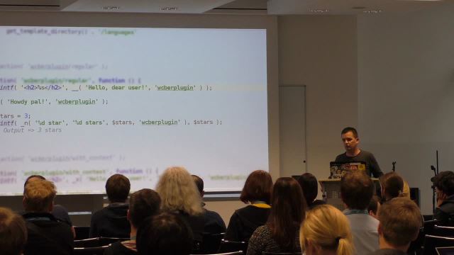 Dennis Ploetner beim WordCamp Berlin - PHP-Code im Hintergrund